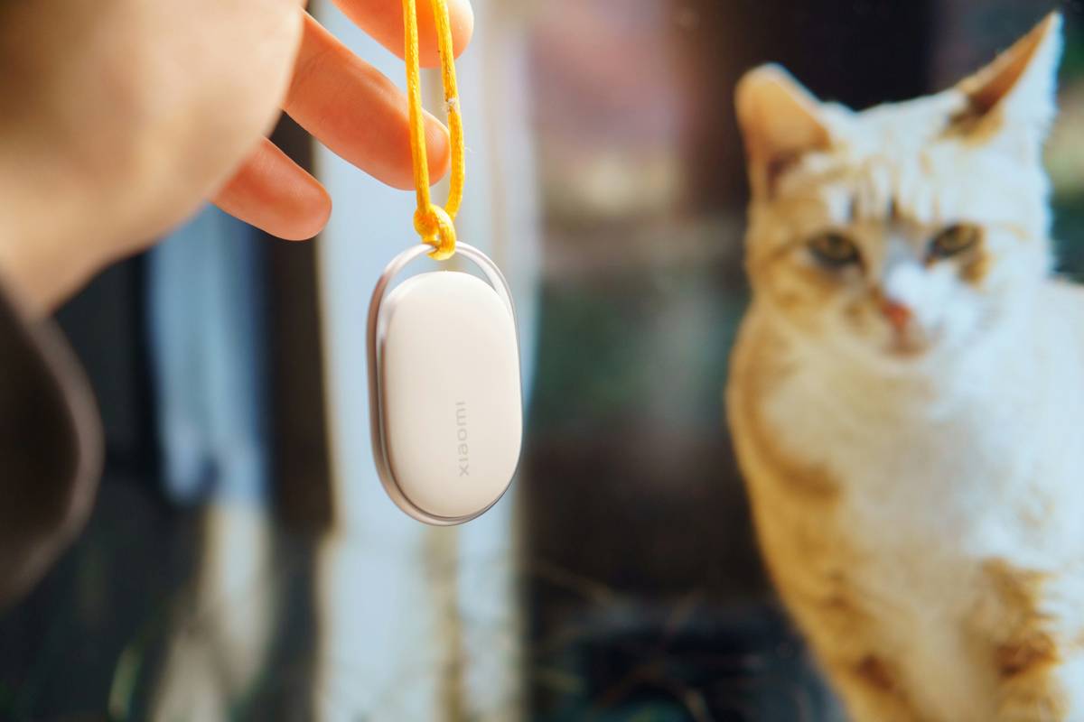 Side-by-side comparison showing manual override button on pet toy with Remote Activation Features